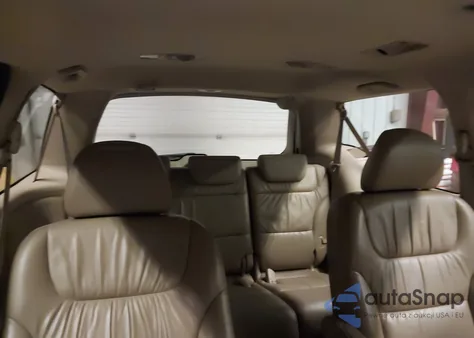 2010 Honda Odyssey Exl z USA, uszkodzony, nr VIN 5FNRL3H7XAB033737